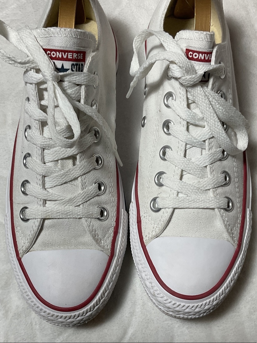 Converse White Canvas Low Top Sneakers with Red Accents